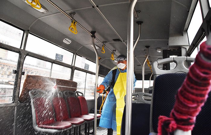   Officials disinfect Bhutan Post buses that ferried passengers from Paro airport to Thimphu yesterday