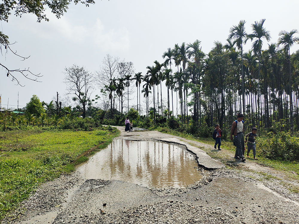 Pothole-filled Chhuzanggang road | Kuensel Online